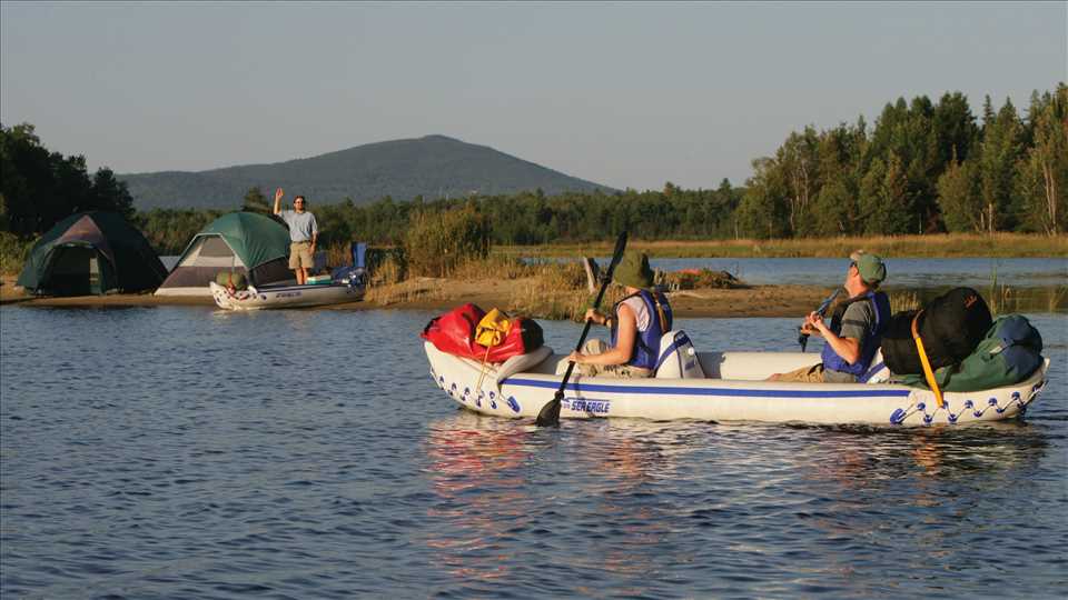 Group of people enjoying the lake